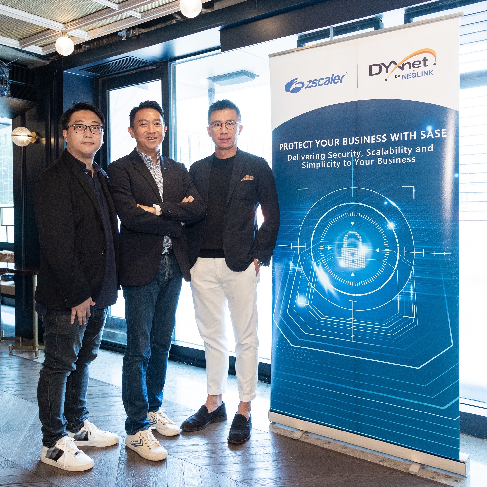 Joe Sze, Group Director, Product & Service Management of DYXnet (Left), Jack Lam, General Manager, Hong Kong Sales of DYXnet (Right) & Henry Yuen, Regional Sales Director, Greater China of Zscaler (Center), announce a strategic partnership to launch DYXnet SASE