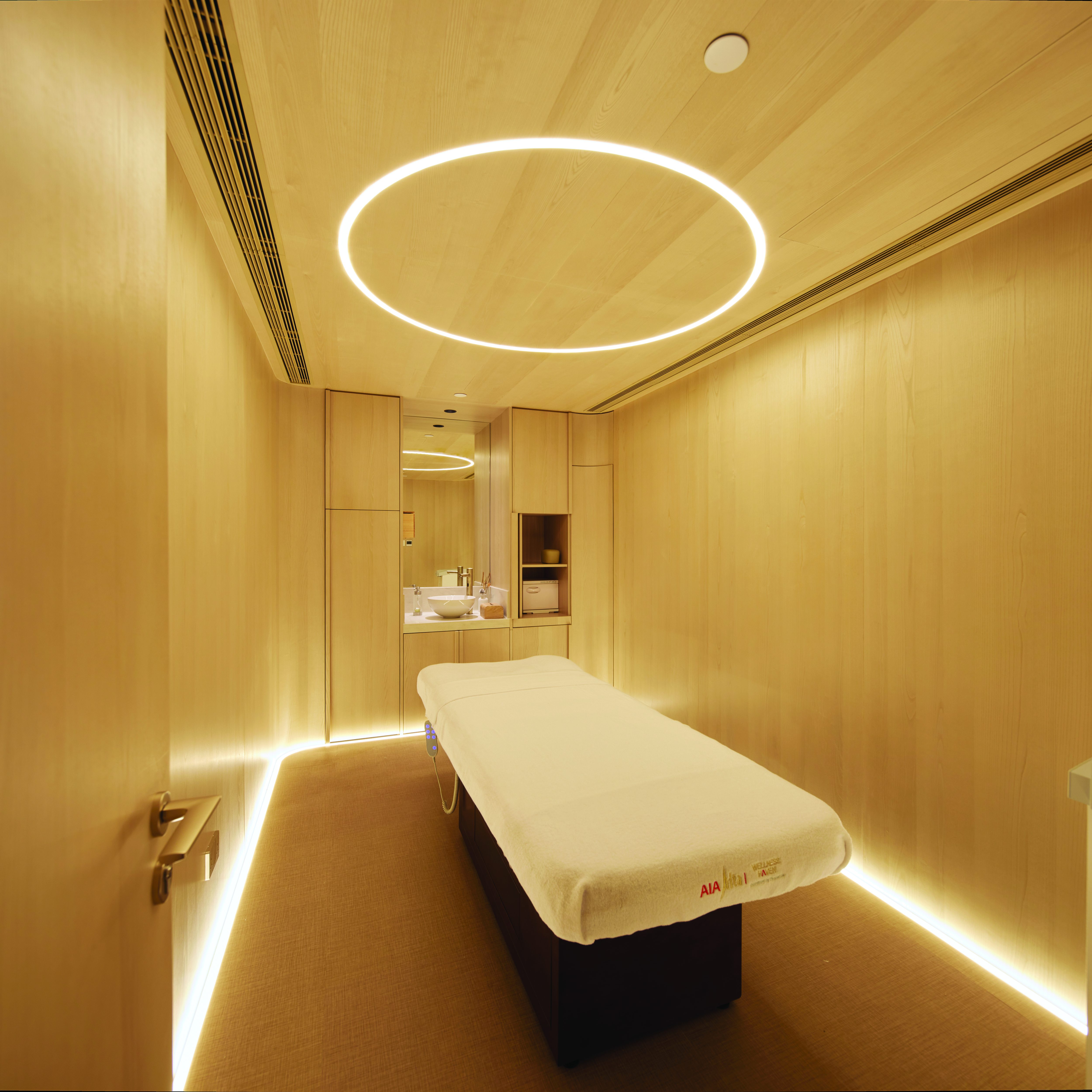 The treatment room of AIA Alta Wellness Haven offers wellness services, such as radiofrequency cupping and cryotherapy.