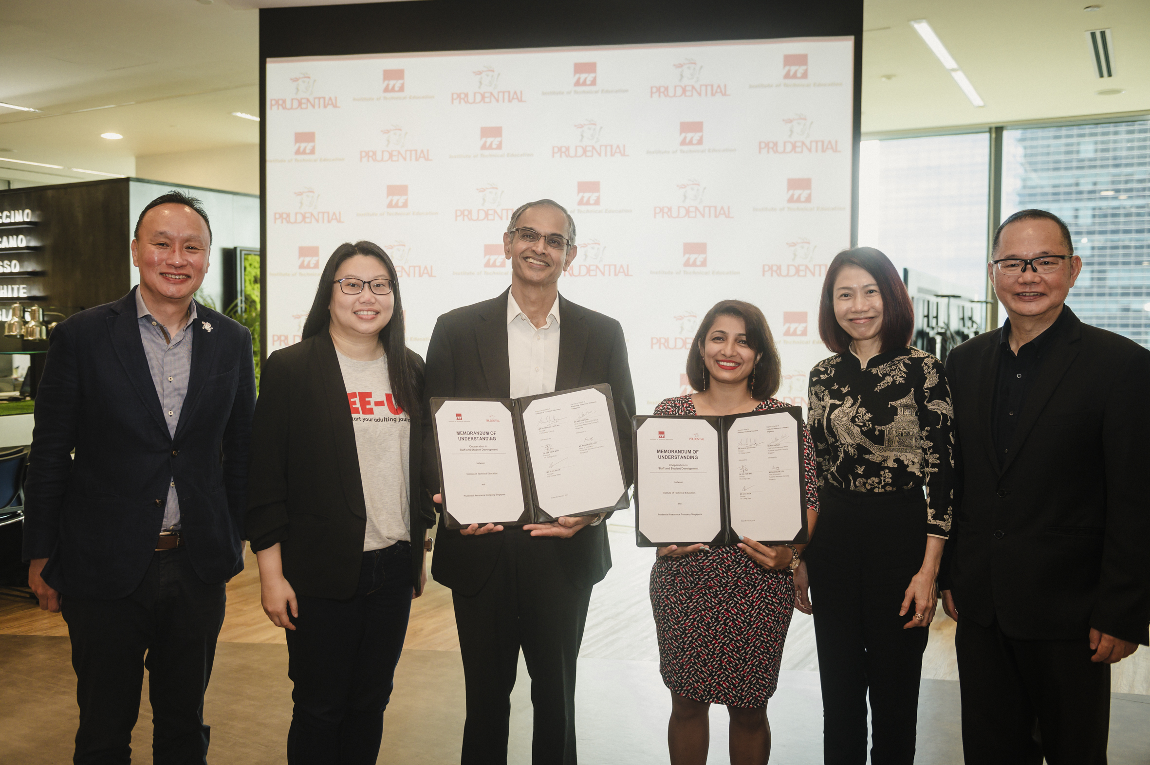 (From left) Mr Ben Tan, Chief Distribution Officer and Chief Corporate Development Officer, Prudential Singapore, Ms Magdalene Loh, Head of Strategy and Innovation, Prudential Singapore, Mr Suresh Natarajan, Principal of Institute of Technical Education (ITE) College Central, Ms Neetha Nair, Chief Human Resources Officer, Prudential Singapore, Ms Alice Seow, Principal of ITE College West, and Dr Yek Tiew Ming, Principal of ITE College East, at the signing of the MOU by Prudential and ITE. The MOU signing was held at Prudential Singapore’s Marina One office.