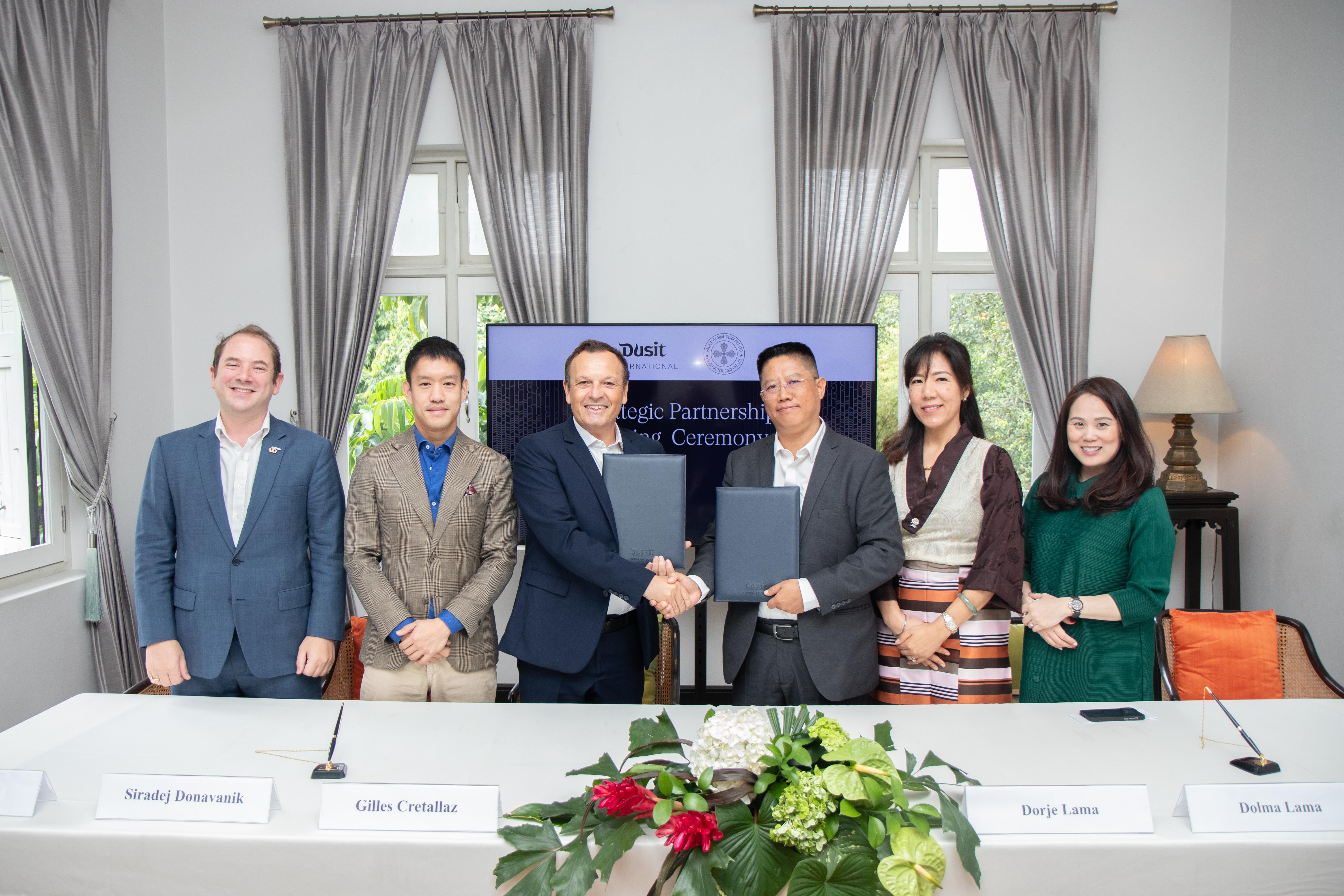 The signing ceremony was held at Baan Dusit Thani in Bangkok. Pictured (from left): Mr John Lohr, Executive Director of External Affairs, Dusit Thani College; Mr Siradej Donavanik, Vice President – Development (Global), Dusit International; Mr Gilles Cretallaz, Chief Operating Officer, Dusit International; Mr Dorje Gyalsten Lama, Chairman, Paljor Global Corp Private Limited; Ms Dolma Tsering Lama, Managing Director, Paljor Global Corp Private Limited; Ms Manisa Mitpaibul, Managing Director, Dusit Foods.