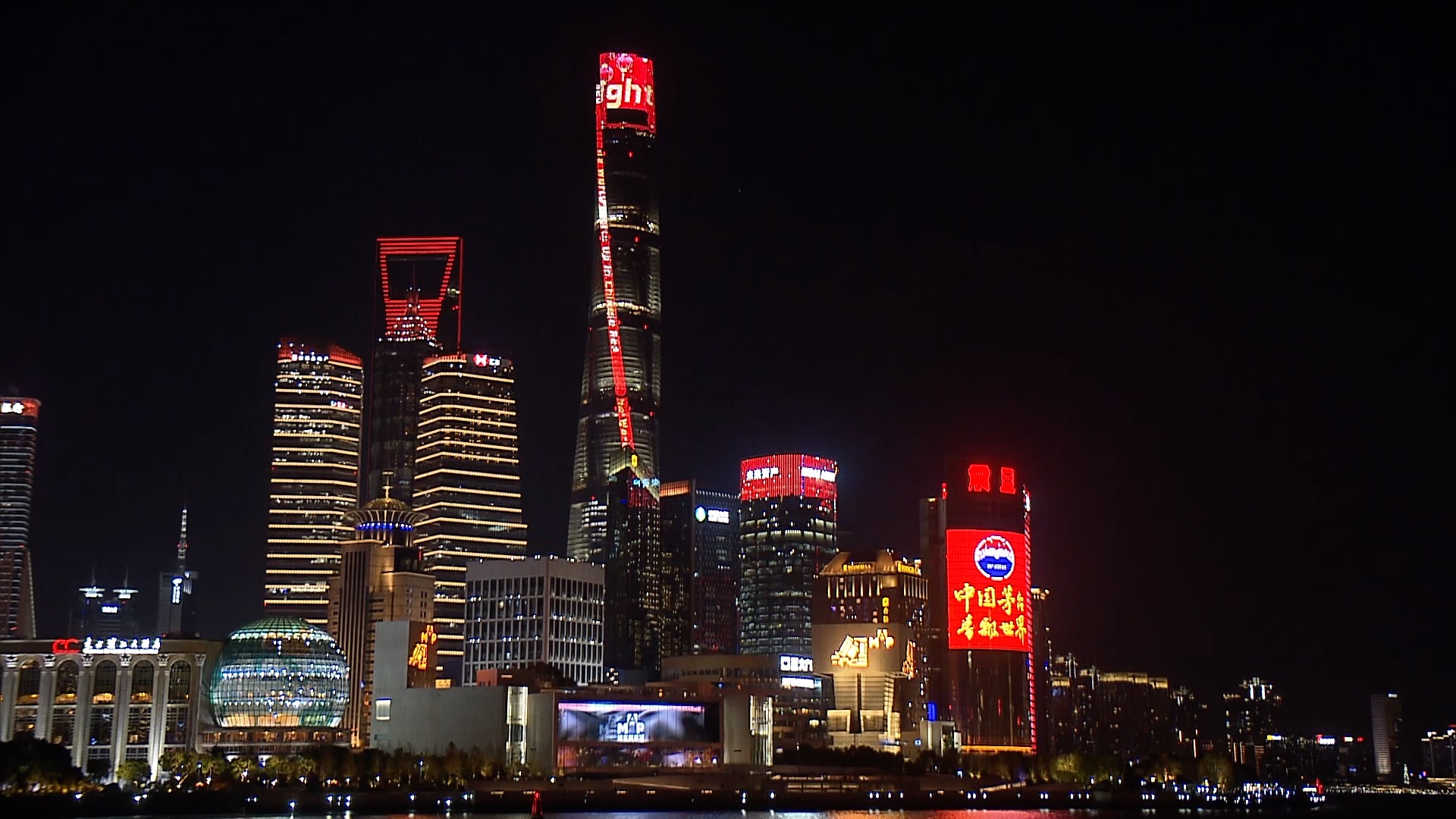 Shanghai Tower lights up in red in the evening on January 28, 2025.